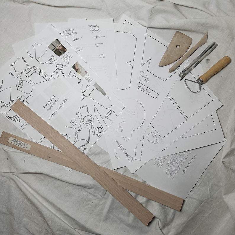May include: A set of pottery mug templates, tools, and wooden rulers for making mugs. The templates include instructions for making a mug, a cylinder, and a square. The tools include a pottery rib, a needle tool, a wooden tool, and a metal tool. The wooden rulers are 12 inches long.