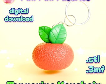 May include: A tangerine keychain with green leaves and a silver keyring. The keychain is orange and has a textured surface. The words "Tangerine Keychain" are written in green. The image also includes the words "digital download".
