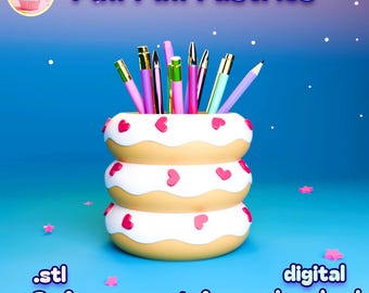 May include: A whimsical, stacked donut-shaped pen holder with white frosting and pink heart sprinkles. The holder contains various pens and pencils. The image includes the text "Puff Puff Pastries", ".stl", ".3mf", "support-free", and "digital download".