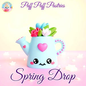 May include: A light blue watering can with a heart-shaped face and a pink heart on the front. The watering can is filled with colorful flowers. The words "Spring Drop" are written in cursive at the bottom of the image. The words "Puff Puff Pastries" are written at the top.