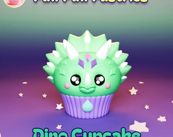 May include: A green triceratops-shaped cupcake with white horns, purple accents, and a cute face. The cupcake sits in a purple and white cupcake liner. The words "Puff Puff Pastries" and "Dino Cupcake" are displayed in the image.