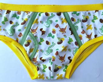 ABDL Herren-Slips mit niedlichem Dinosaurier-Motiv, Baumwollunterwäsche, Cartoon-Dinosaurier-Print, bunte Borte, weiche und bequeme Slips.