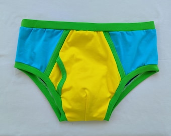 Bunte Herren-Slips mit Farbblockmuster – Handgefertigte Baumwollunterwäsche, gelb-blau-grüne Slips, witzige Herrenunterwäsche.