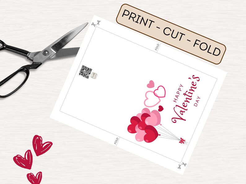 May include: Printable Valentine's Day card featuring a design of pink and red heart-shaped balloons with the text "Happy Valentine's Day".