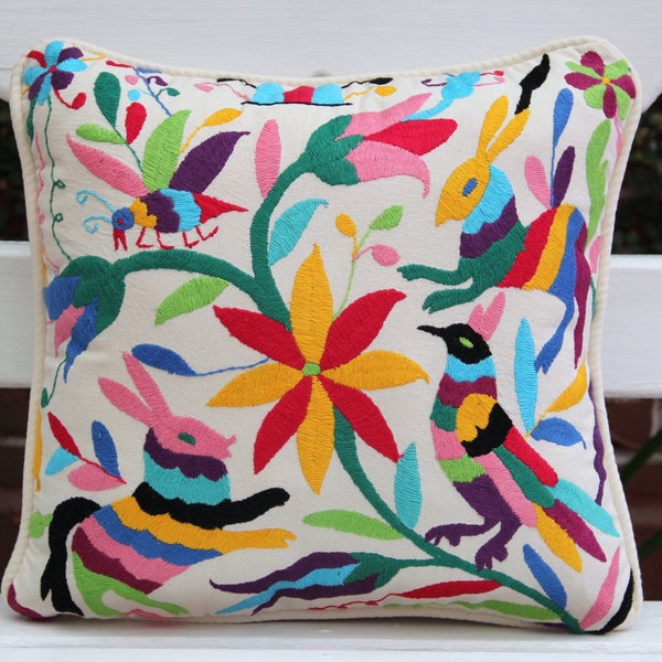 Multi colored Otomi Sham backed and piped with handwoven artisan rustic eco textiles