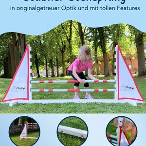 May include: White and red jump hurdle with a white flag on each side. The flags have a red border and a white horse logo with the word "Hoopys" printed on them. The hurdle is adjustable and can be disassembled for easy transport. The image shows a young girl jumping over the hurdle.