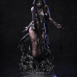 May include: A detailed statue of a dark-haired figure with a crescent moon headpiece, adorned with intricate black body art and jewelry. The figure stands on a textured base with a dark, smoky effect, creating a dramatic and mystical aesthetic.