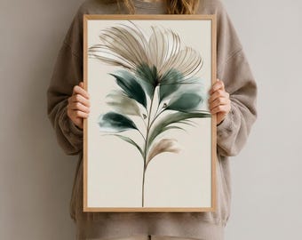 Könnte beinhalten: Ein rechteckiger gerahmter Wandkunstdruck mit einer botanischen Illustration einer einzelnen Pflanze mit länglichen, fließenden Blättern in den Farben Dunkelwaldgrün, Salbei und sanftem Beige auf einem neutralen, cremeweißen Hintergrund in einem hellen Holzrahmen.