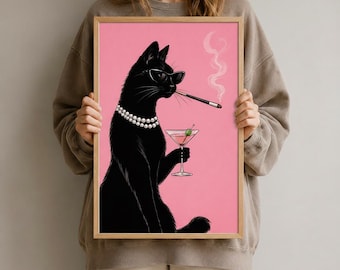 May include: A framed art print featuring a black cat wearing sunglasses and a pearl necklace, smoking a cigarette and holding a martini. The background is pink. The frame is made of wood.
