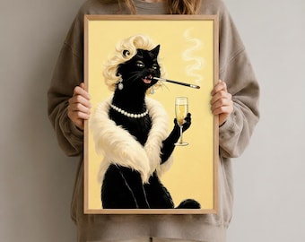May include: A framed art print featuring a black cat with blonde hair, a pearl necklace, and a white fur stole. The cat holds a champagne glass and a cigarette in a holder, with smoke rising. The background is a pale yellow.