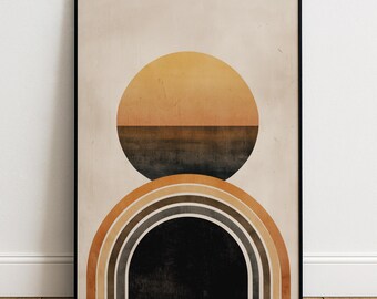 Puede incluir: Impresión artística abstracta con un círculo en capas en tonos amarillos, naranjas y marrones, sobre una forma de arcoíris en tonos similares. La obra de arte está sobre un fondo beige y enmarcada en negro.