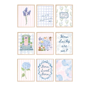 May include: Nine framed watercolor prints with a light wood frame. The prints feature floral and architectural designs, along with text such as "Meet Me in Stephenville XO" and "Dorm Sweet Dorm". The color palette includes pink, blue, and white.