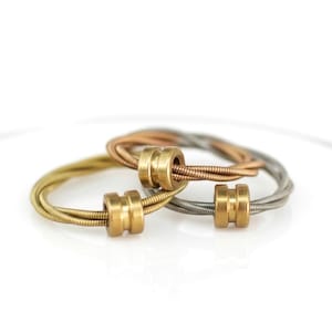 Fidgetring gerecyclede gitaarsnaar: spinnenangstverlichtingssieraden, bronszilver koper