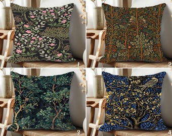 May include: Four decorative throw pillows with nature-themed designs. The pillows feature intricate patterns of trees, leaves, and flowers in various color schemes, including dark green, navy blue, and brown. Each pillow is square-shaped.
