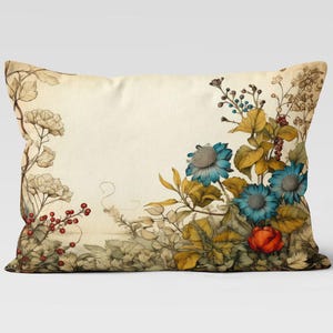 May include: Rectangular pillow with a floral design. The pillow features a cream-colored background with a botanical illustration of blue flowers, red berries, and yellow leaves. The design is reminiscent of vintage botanical prints.