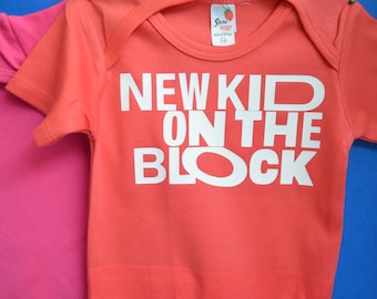 New Kid on The Block baby Bright colored cotton bodysuit