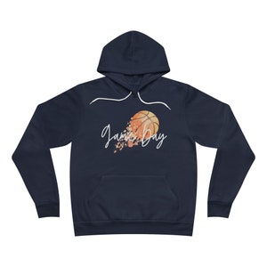May include: Navy blue hoodie with a white graphic of a basketball with the text "Game Day" in white.