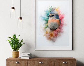 May include: A framed art print featuring a colorful bird illustration. The bird has blue, orange, and gray feathers, set against a backdrop of pastel-colored paint splashes. The artwork is displayed in a white frame.