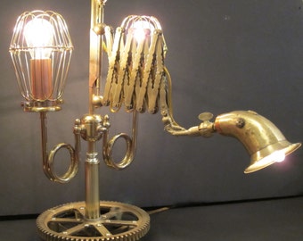 The Inventor's Lamp, a 3 way scissor arm table lamp