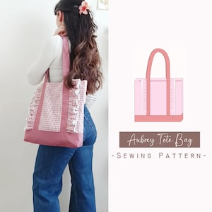 May include: A pink and white gingham tote bag with solid pink panels, two shoulder straps, and white ruffled trim along the sides. The text Aubrey Tote Bag - Sewing Pattern - is displayed next to a digital illustration of the bag.