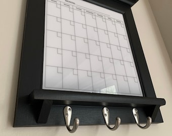 White Dry Erase Calendar Organizer and Family Planner for Kitchen, Home Decor, or for Office Organizing with shelf and key hooks. Whiteboard