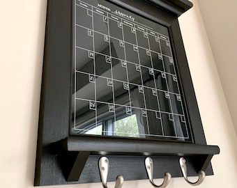 Black Dry Erase Calendar Organizer and Family Planner for Kitchen, Home Decor, or for Office Organizing with shelf and key hooks. Whiteboard