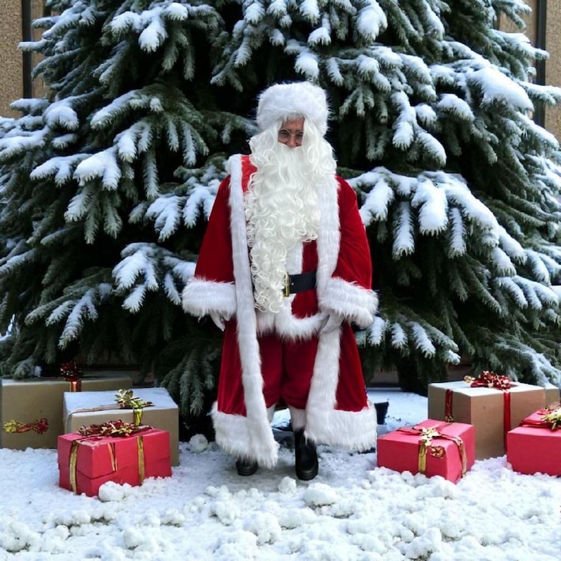 May include: Santa Claus in a red velvet suit with white faux fur trim, a matching hat, and a long white beard. He stands in front of a snow-covered Christmas tree, with wrapped gifts at his feet. The gifts are red and brown.