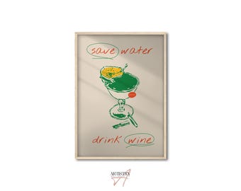 May include: A framed art print with a beige background features a green cocktail in a stemmed glass. The words "save water" and "drink wine" are written in red and green. A slice of fruit and a straw are in the drink.