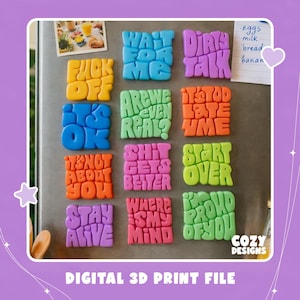 May include: A collection of twelve square, colourful 3D-printed magnets featuring bubble-style typography with phrases including FUCK OFF, WAIT FOR ME, DIRTY TALK, IT'S OK, ARE WE EVEN REAL?, IT'S TOO LATE, IT'S NOT ABOUT YOU, SHIT GETS BETTER, START OVER, STAY ALIVE, WHERE IS MY MIND, and I'M PROUD OF YOU.