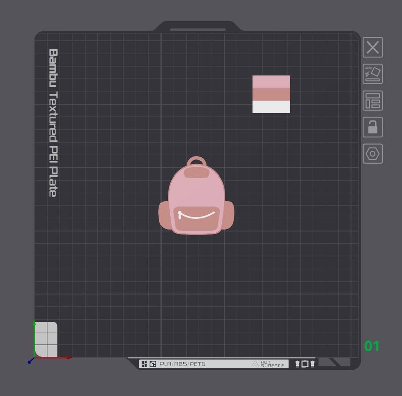 Puede incluir: Una interfaz digital que muestra una placa Bambu Textured PEI con un fondo de cuadr&iacute;cula. Centrado hay un icono de mochila rosa claro con un bolsillo rosa m&aacute;s oscuro y una l&iacute;nea de cremallera blanca. Arriba hay un peque&ntilde;o cuadrado con tres colores.