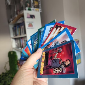 Carte collezionabili di The Last Of Us - Parte 2: mazzo completo da 48 carte collezionabili.