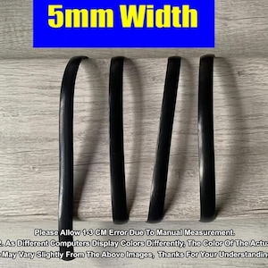 May include: Four black, curved strips are displayed against a light wood-grain background. The text "5mm Width" is in yellow letters on a blue background. The image also contains text about measurement error and color variations.