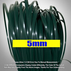May include: Dark green, flat, flexible material, possibly ribbon or strapping, is coiled in a dense bundle. A yellow rectangle with the text "5mm" in blue is overlaid on the material. The material appears to be approximately 0.2 inches wide.