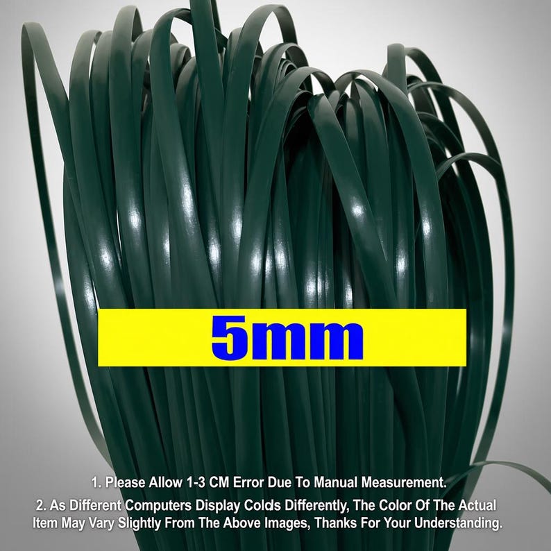 May include: Dark green, flat, flexible material, possibly ribbon or strapping, is coiled in a dense bundle. A yellow rectangle with the text "5mm" in blue is overlaid on the material. The material appears to be approximately 0.2 inches wide.