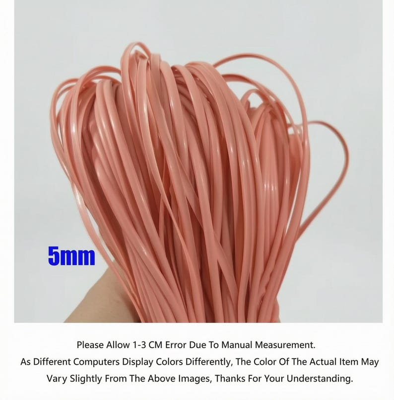 May include: A bundle of light pink, flat, 5mm wide, plastic cord. The cord is tightly coiled, with some strands extending outwards. The image includes text that says "5mm".