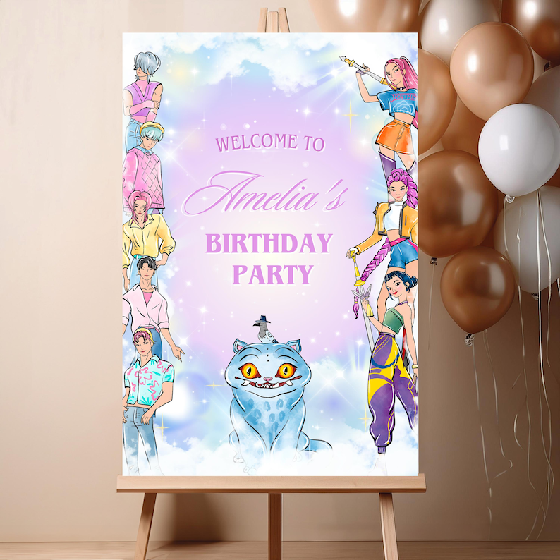 May include: A sign on an easel with the text "Welcome to Amelia's Birthday Party." The sign features illustrations of cartoon characters and a blue cat. Balloons in shades of brown and white are in the background.