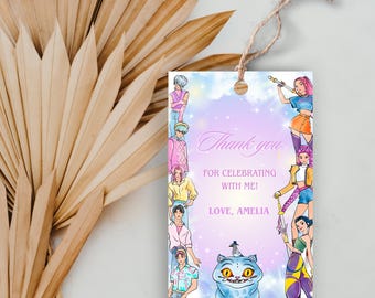 May include: A rectangular gift tag with a watercolour design. The tag features anime-style illustrations of people and a blue cat. Text on the tag reads "Thank you for celebrating with me! Love, Amelia."