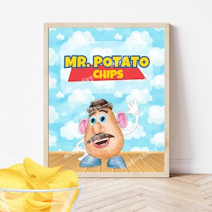 May include: A framed print featuring Mr. Potato Head with the text "MR. POTATO CHIPS" against a blue sky background with clouds. The image includes a bowl of potato chips in the foreground. The artwork has a cartoon style.