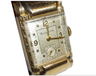 1949 Bulova Mens Wrist Watch. Rectangular / Runs / Manual Wind / 17 Jewel Movement. Unisex. 10k Rolled Gold Filled. Sharp Looking Watch.