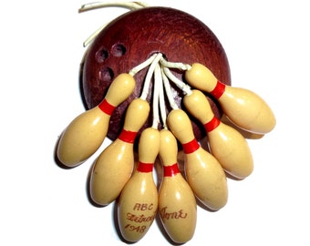 Bakelite Bowling Ball 5 Pins Dangle Brooch Pin Vintage - Etsy Vintage Bakelite Bowling Ball and Dangling Pins Brooch Pin main image 0