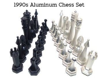 Vintage Aluminum Chess Pieces. Modernist. Possibly One of a Kind Machined, and Designed by Tornos Tech. Used in 1994 Magazine Advertisement