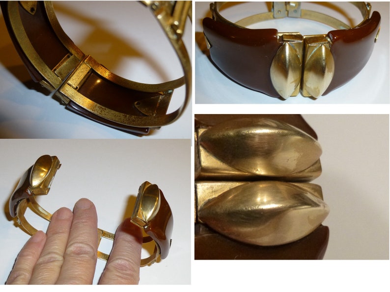May include: A brown bakelite hinged bangle bracelet with gold-tone metal accents. The bracelet has two large, oval-shaped, gold-tone metal accents on the front.