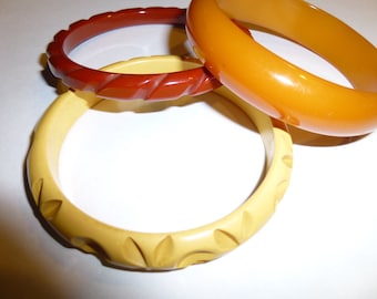 SOLD INDIVIDUALLY Vintage Bakelite Bangles.  Tested & Guaranteed. 1940s USA. Earth Tones. Carved Yellow, Domed Orange, Rope Carved Maroon