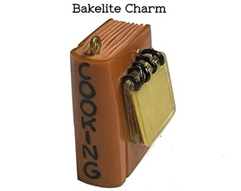 Unusual Bakelite "Charm" Piece. Figural "Cooking Book". Tested. Circa 1940s. Tiny 1.25" Tall