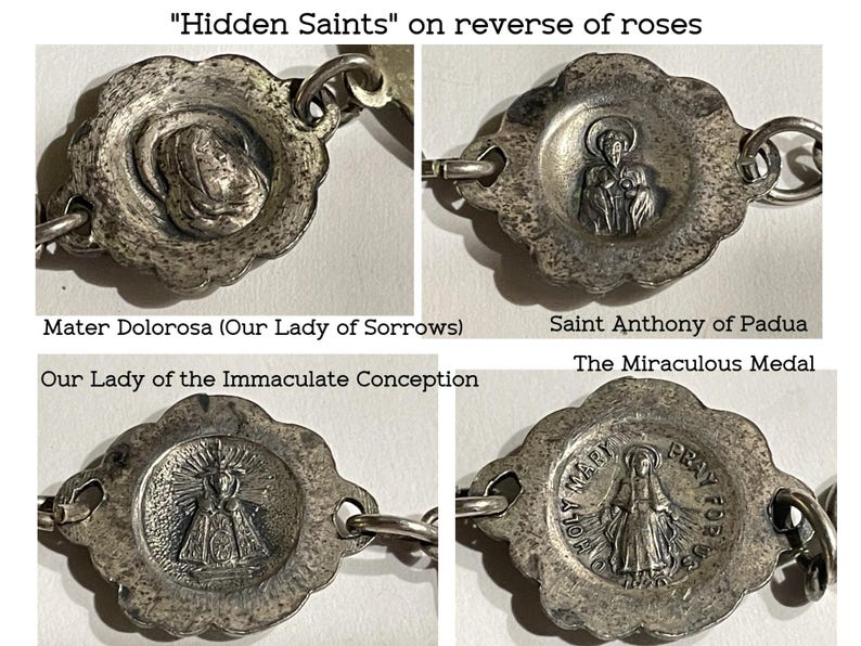 May include: A silver-toned metal rosary chain featuring four distinct circular links with scalloped edges. Each link displays a relief image of a religious figure, including Mater Dolorosa, Saint Anthony of Padua, Our Lady of the Immaculate Conception, and the Miraculous Medal with the text Holy Mary Pray For Us.