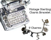 Vintage Charm Bracelet with Nine- 9 Charms. Graduation, Typewriter, Skate, Water Skier, Sewing Machine, Piano, Graduation, etc.