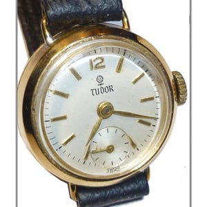 Vintage 9k Gold TUDOR Movement in ROLEX Case. Ladies Watch. 17 Jewel Manual Wind . Dated 1987. Works. Inset Second Hand.