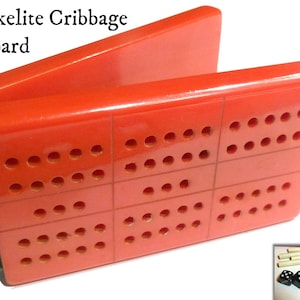 Red Catalin Bakelite Folding Cribbage Board.  Circa 1940s.  USA. Included Tiniest Dice Ever. Tested Vintage Bakelite, Guaranteed Authentic.