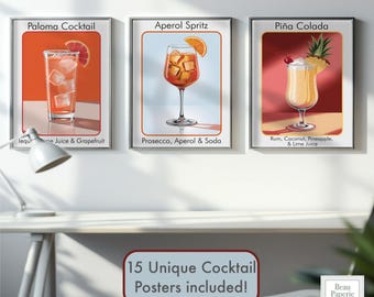 May include: Three framed cocktail posters: Paloma, Aperol Spritz, and Piña Colada. The Paloma poster features a cocktail with grapefruit. The Aperol Spritz poster shows a cocktail with an orange slice. The Piña Colada poster displays a cocktail with pineapple and a cherry. The text reads "15 Unique Cocktail Posters included!"