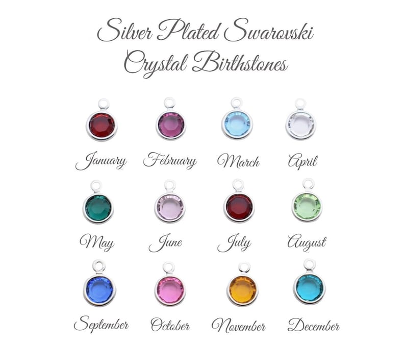 May include: Twelve silver-plated charms with Swarovski crystal birthstones. Each charm features a different colored crystal representing a month of the year. January is red, February is pink, March is light blue, April is white, May is green, June is light pink, July is red, August is light green, September is blue, October is pink, November is orange, and December is light blue.